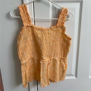 Orange and white ruffled tank top (size Medium)